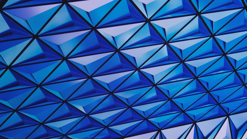 architectural photography of blue glass celing