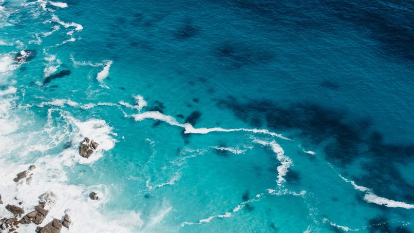 aerial view of seashore with stones