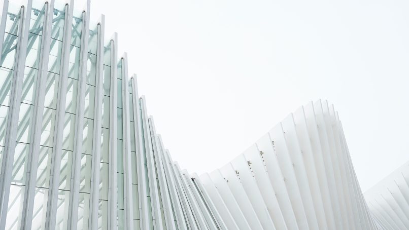 photo of white painted building at daytime