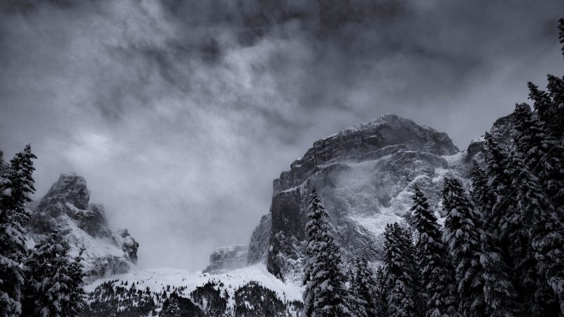 grayscale photography of summit view of mountain covered with snow