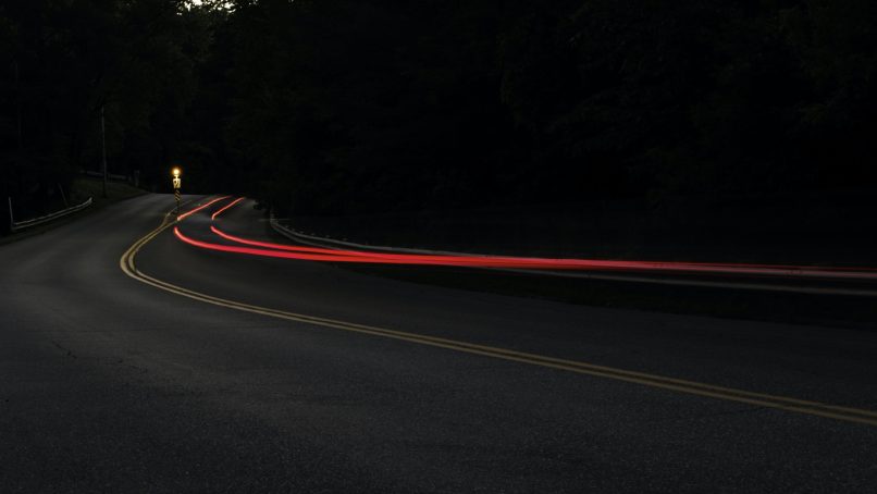 concrete road with cars passing