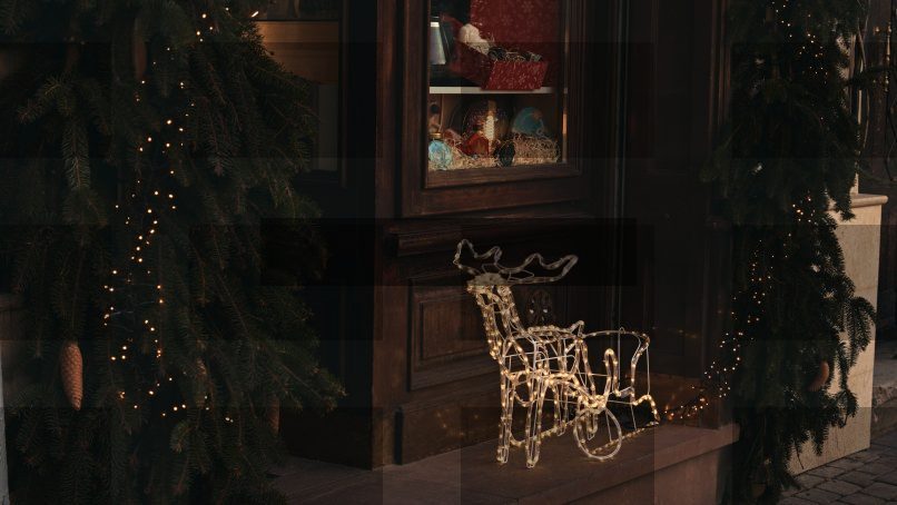 a lighted christmas sleigh in front of a store — Samsung Frame TV art