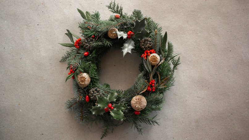 green and brown wreath with baubles