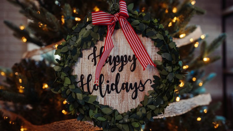 selective focus photo of Happy Holidays board decor