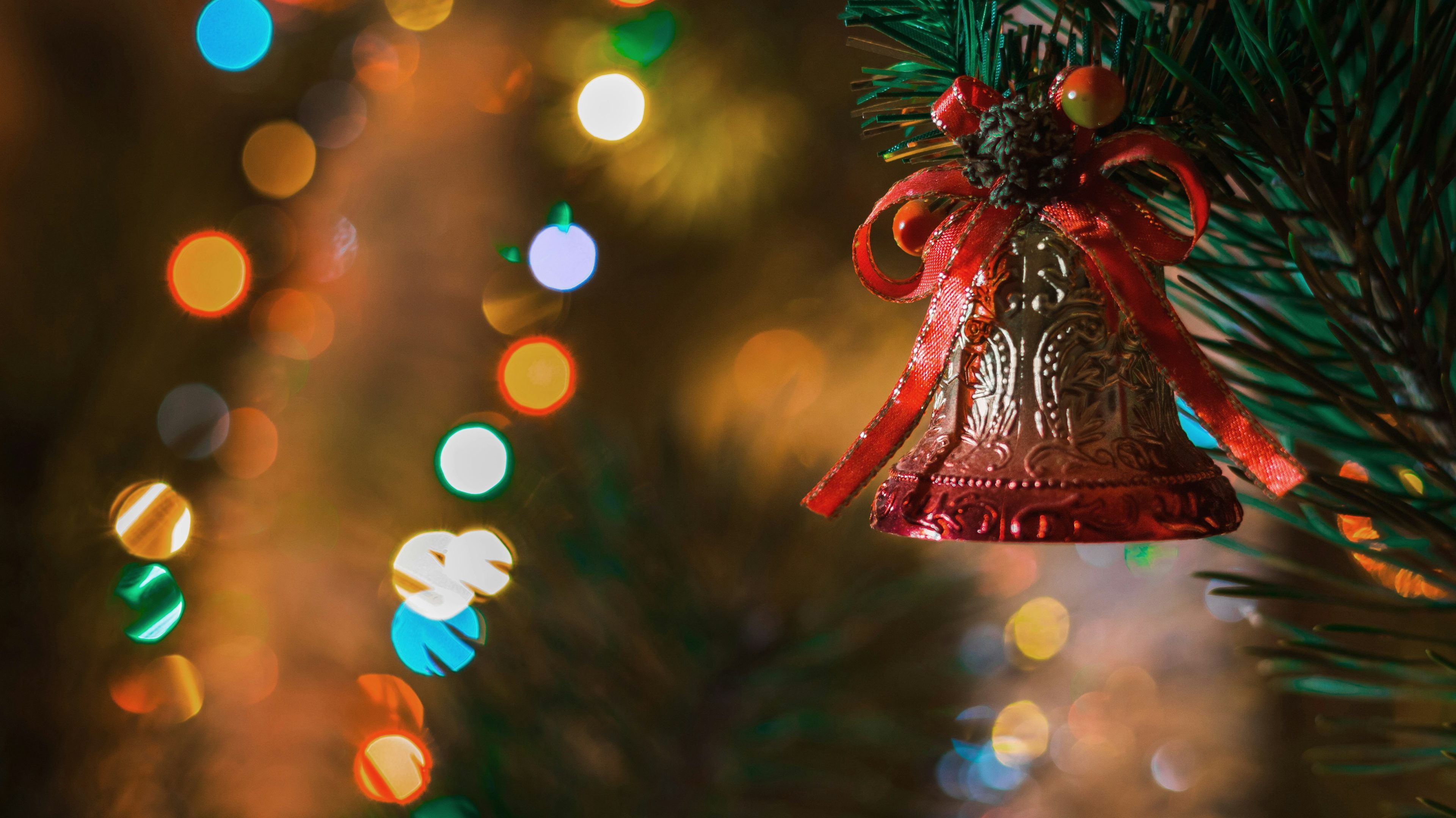 a christmas ornament hanging from a christmas tree