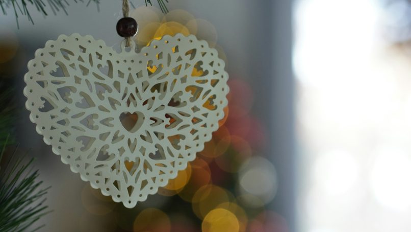 a white and black object with yellow dots on it