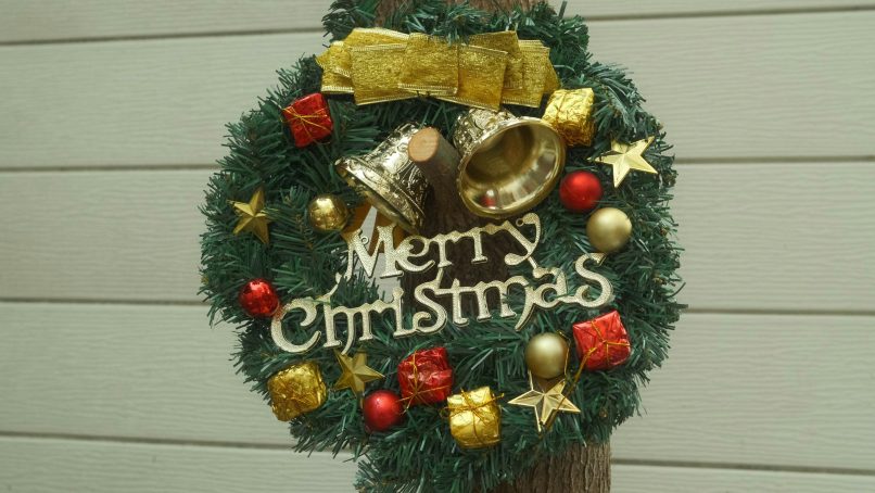 A christmas wreath with bells and ornaments