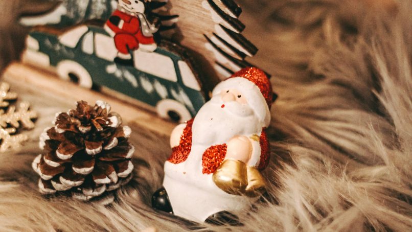 white and red ceramic snowman figurine