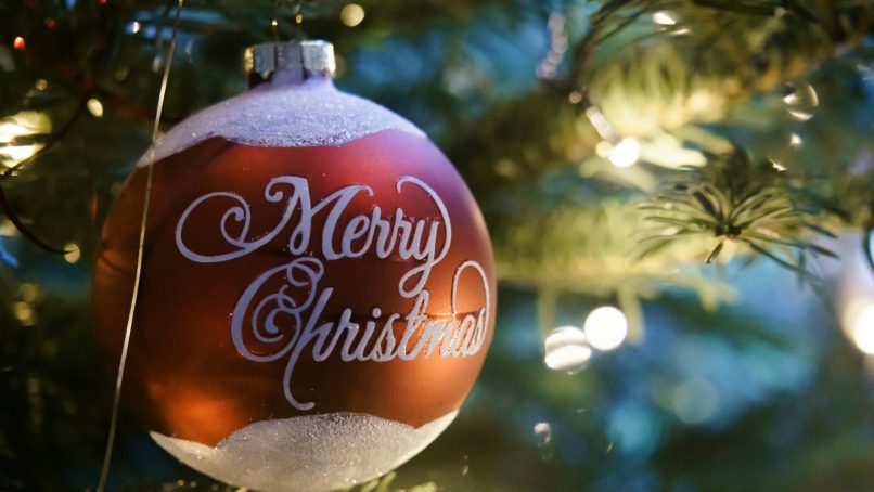 A christmas ornament hanging from a christmas tree