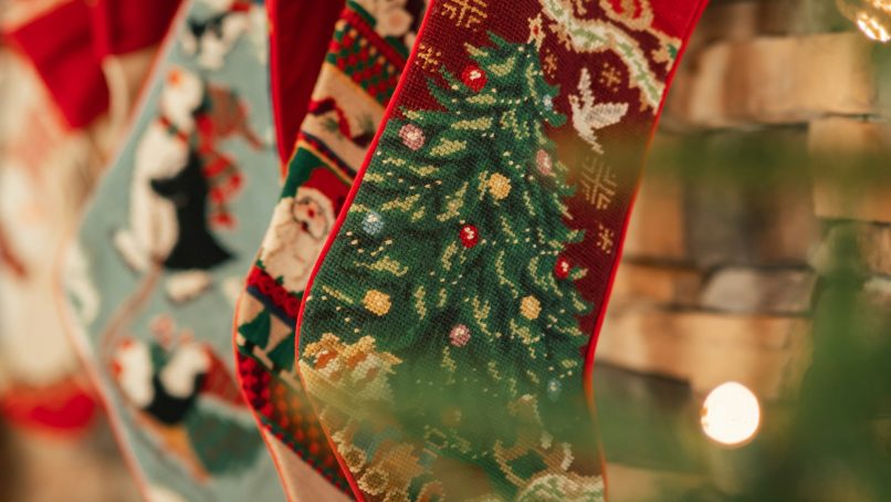 a christmas tree with a red and white cloth from it