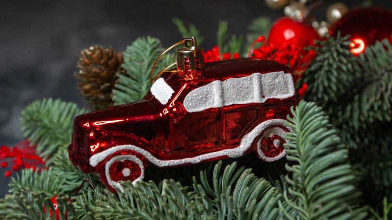 red and white vintage car scale model