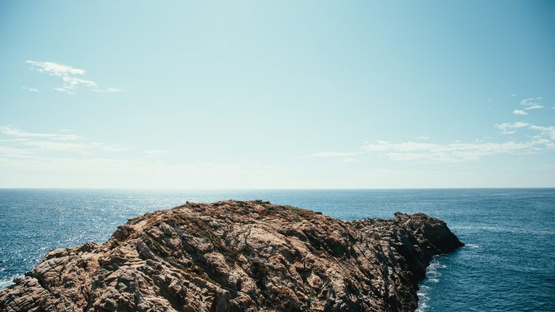 A rocky cliff in the ocean — Samsung Frame TV art