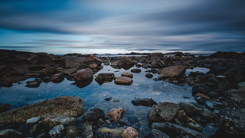 Serene rocky beach under a cloudy sky — Samsung Frame TV art