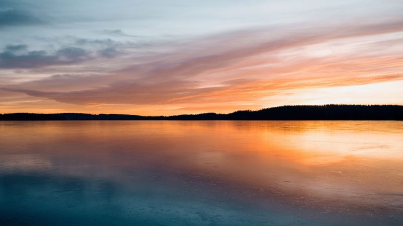Colorful sunset reflecting on calm frozen lake — Samsung Frame TV art