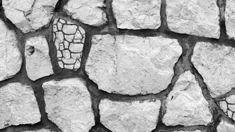 Gray stone wall composed of unevenly shaped blocks with mortar — Samsung Frame TV art