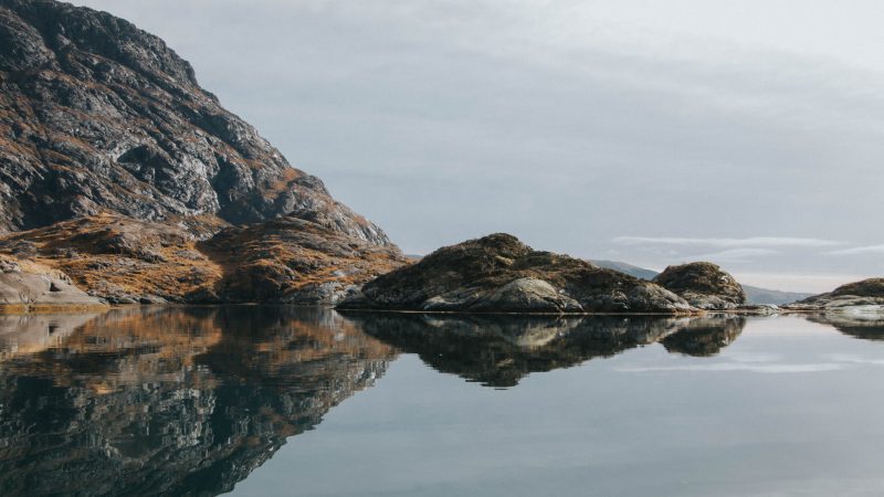 Serene lake reflecting rocky mountains and a clear sky — Samsung Frame TV art