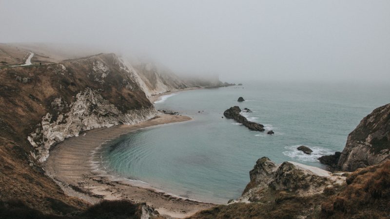 Foggy coastal bay with smooth waves gently touching the shore. — Samsung Frame TV art