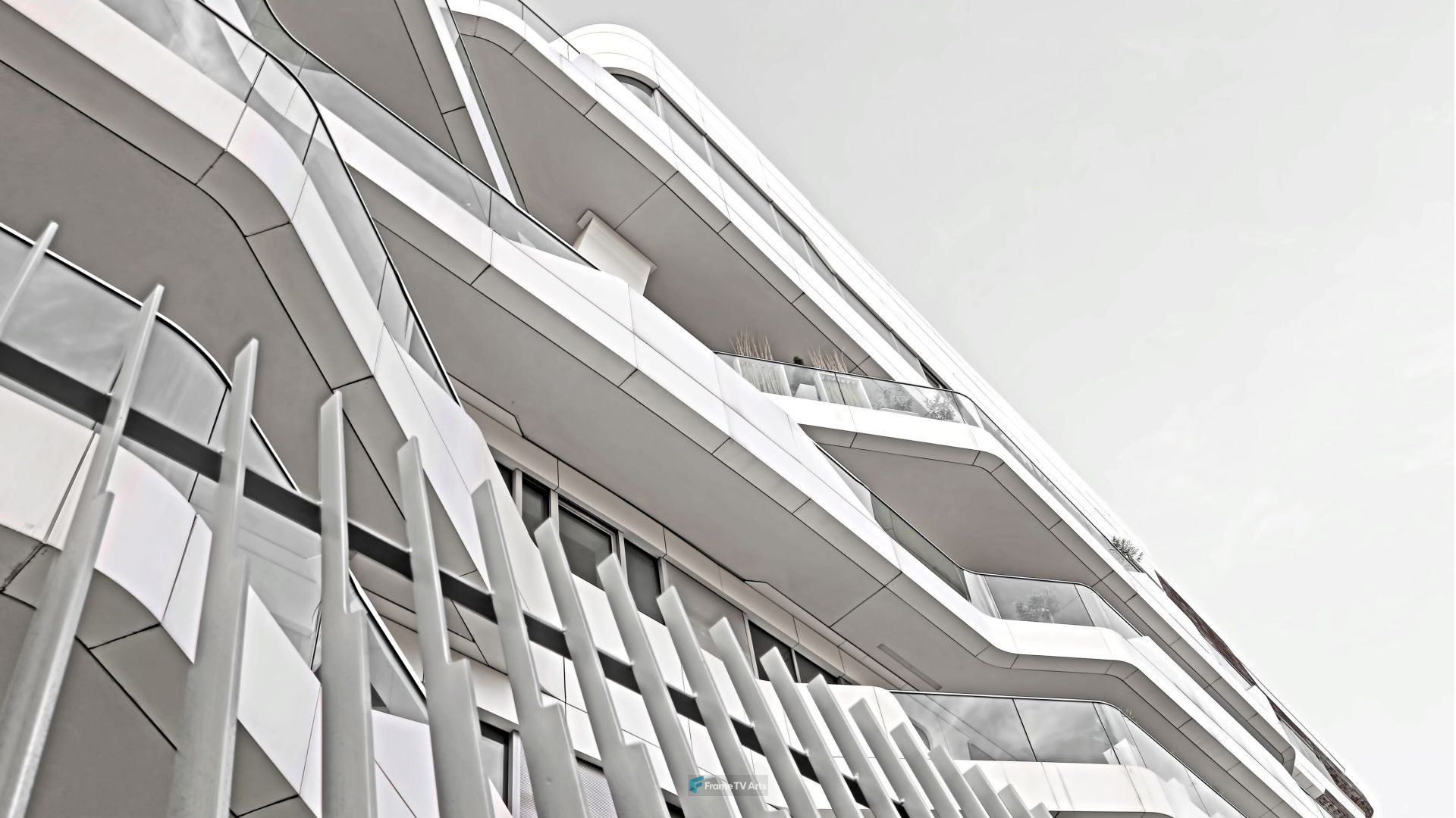 Futuristic white building with reflective glass and curves. — Samsung Frame TV art