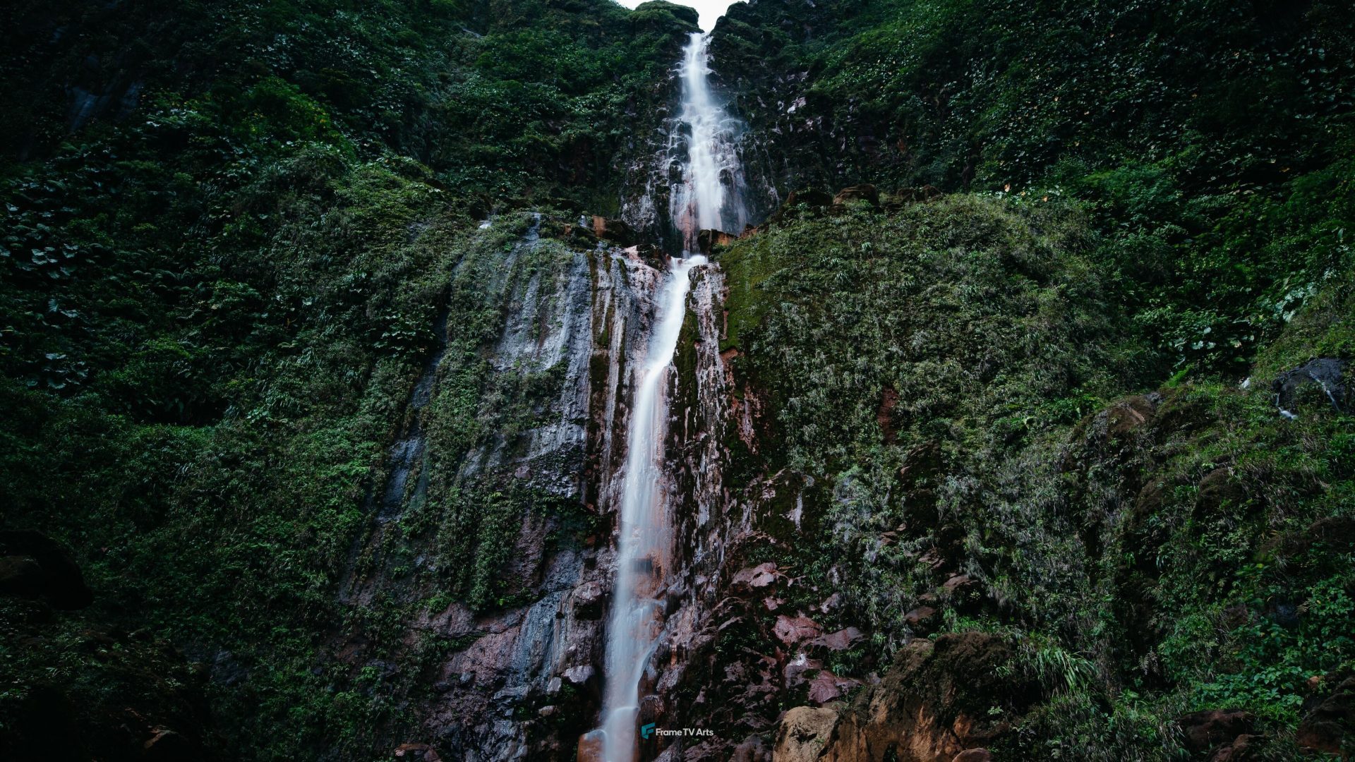 Majestic waterfall cascading down lush green mountain — Samsung Frame TV art