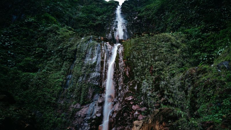 Majestic waterfall cascading down lush green mountain — Samsung Frame TV art