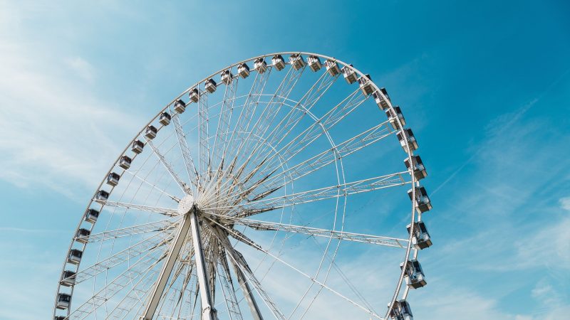 Gigantic Ferris wheel under a clear blue sky during daytime — Samsung Frame TV art