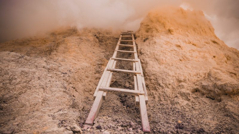 A wooden ladder placed against a rock covered with clouds — Samsung Frame TV art