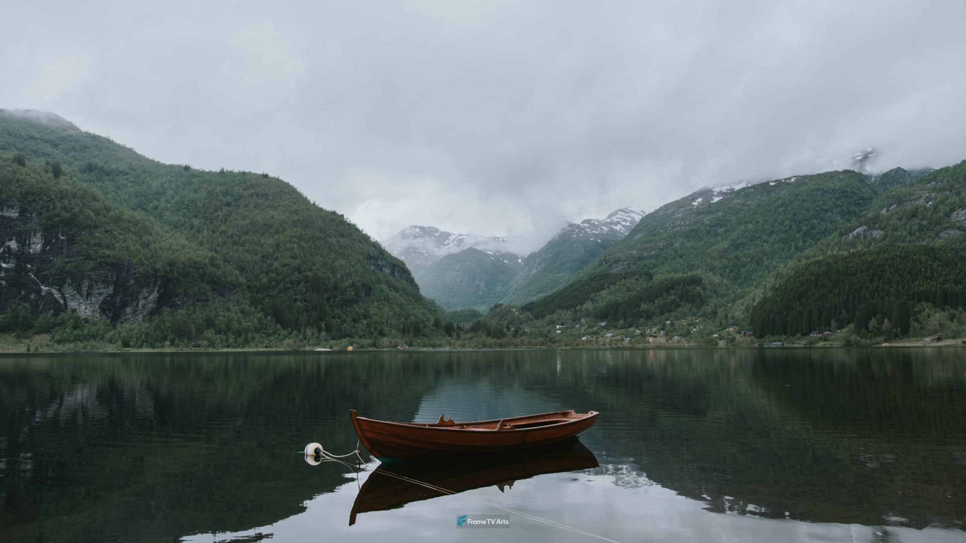 brown boat on body of water near green mountains under white sky at daytime — Samsung Frame TV art