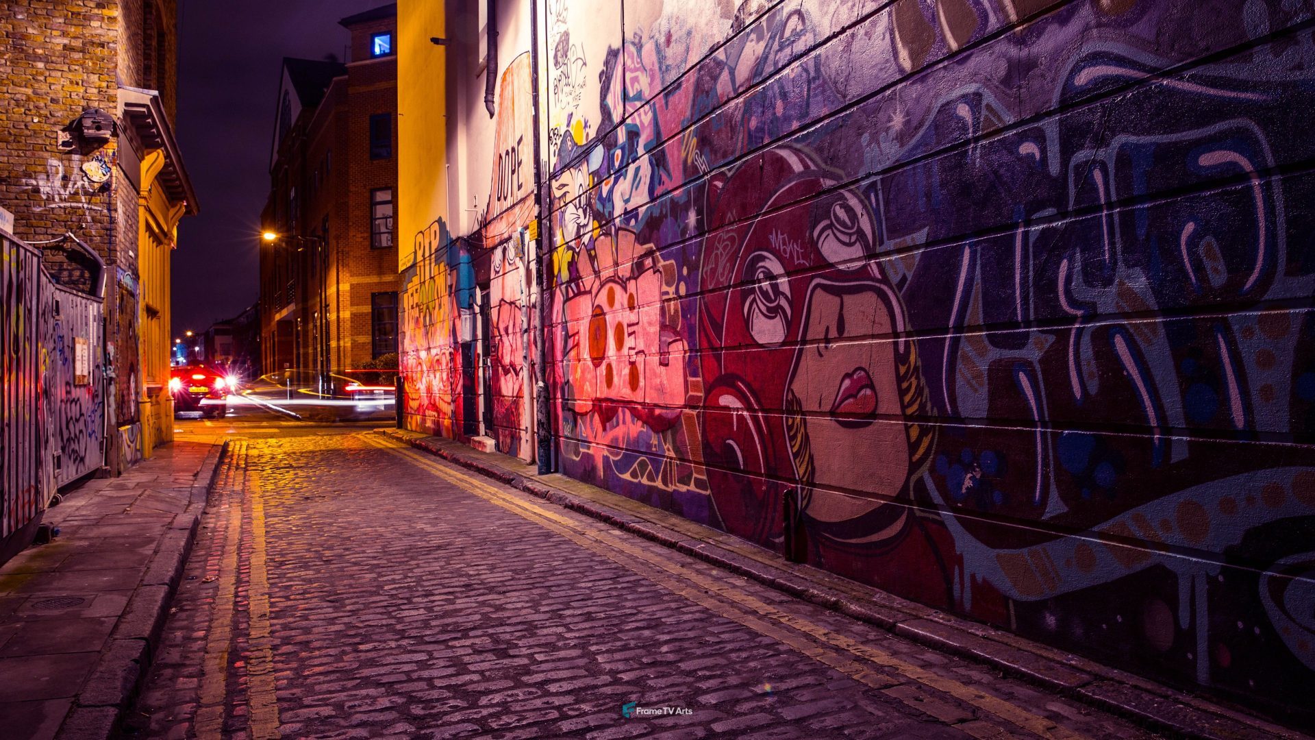 A brick road with graffiti on the side of a building — Samsung Frame TV art