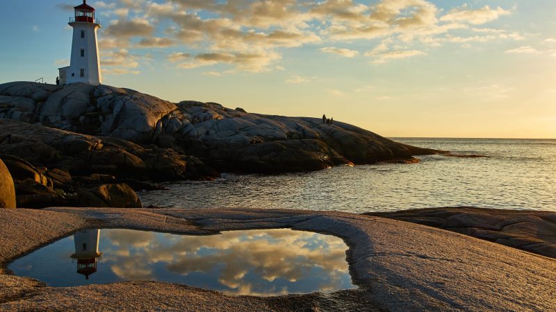 A lighthouse on a rocky beach — Samsung Frame TV art