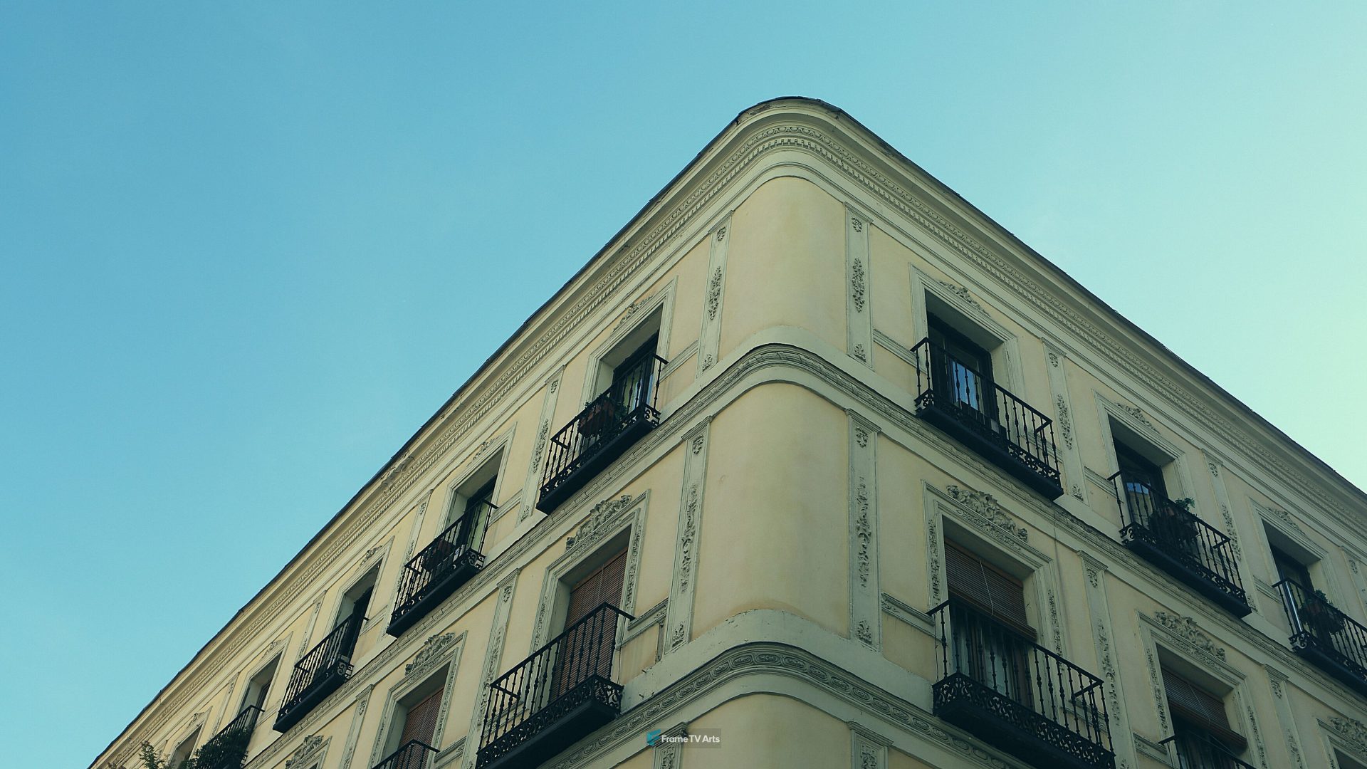 Corner of elegant historic building under clear blue sky — Samsung Frame TV art