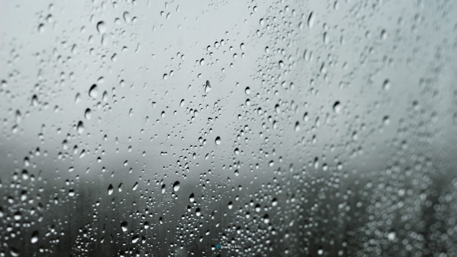 Raindrops on a window with blurred rainy landscape in background. — Samsung Frame TV art