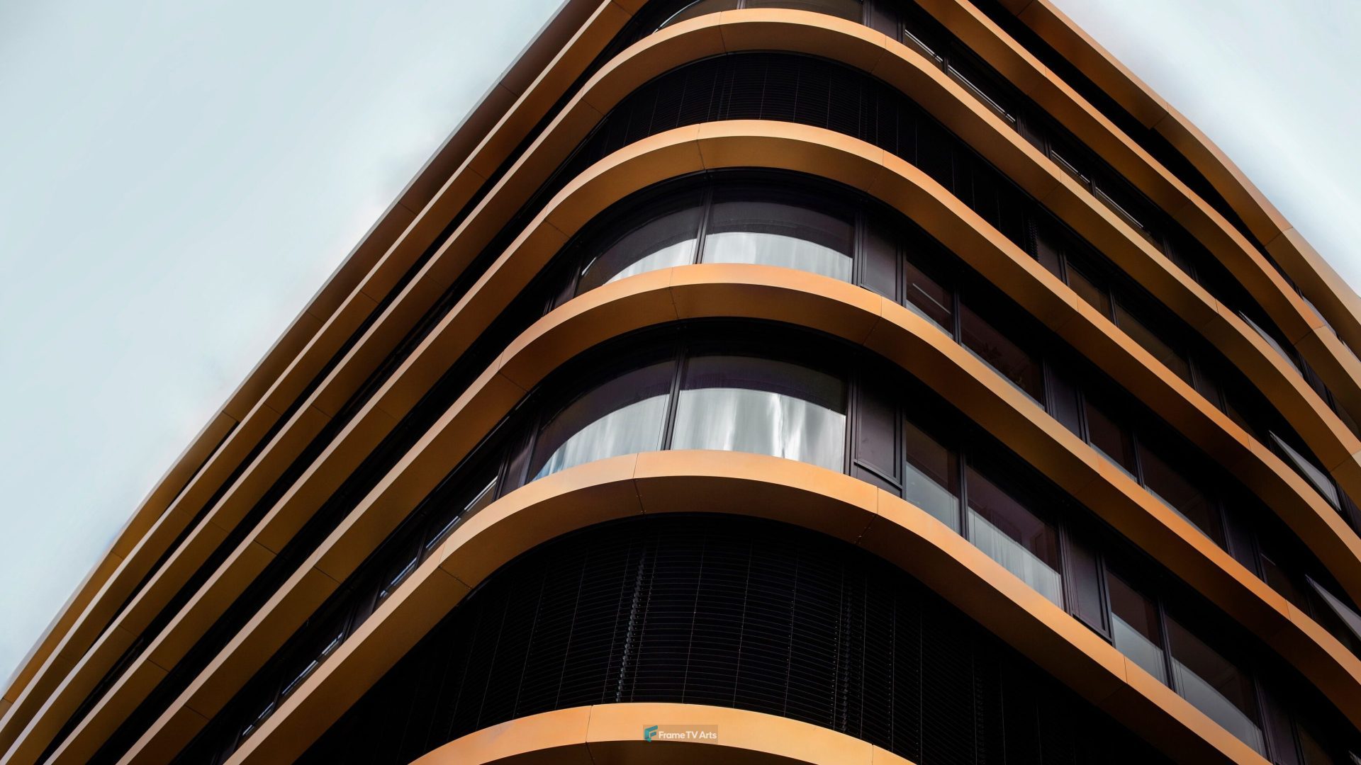Curved modern building with sleek glass windows. — Samsung Frame TV art