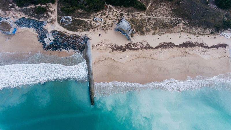 Aerial view of tranquil beach with waves and rocks — Samsung Frame TV art