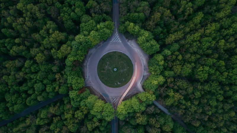 Aerial view of forest roundabout with surrounding trees — Samsung Frame TV art