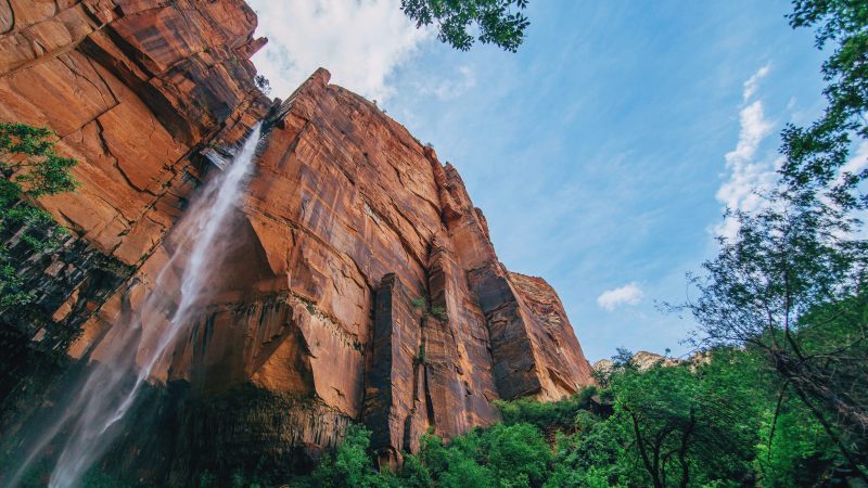 Tall waterfall cascading down red rock canyon — Samsung Frame TV art