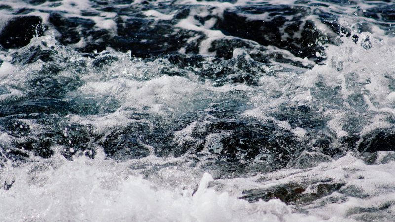Waves crashing waves on a rocky surface — Samsung Frame TV art