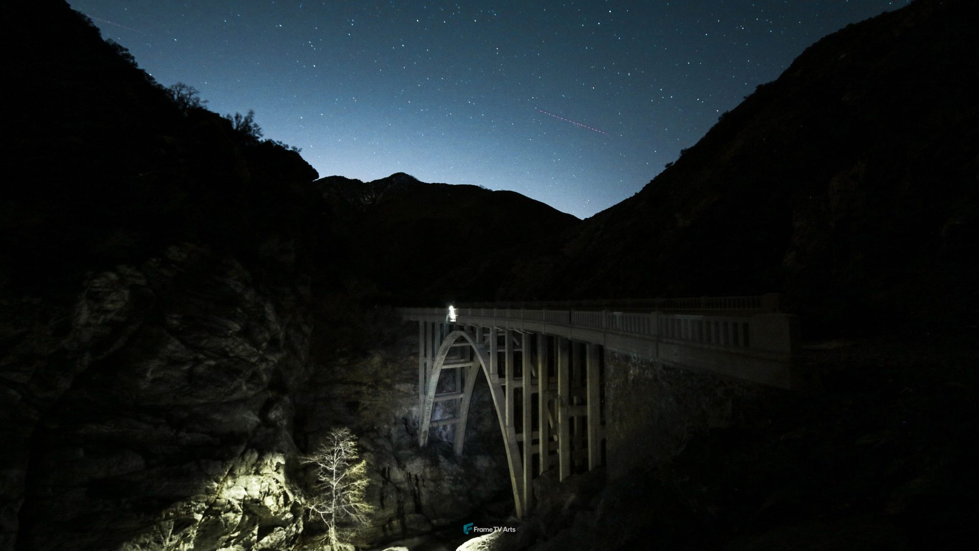 Illuminated bridge in a starry mountain night — Samsung Frame TV art