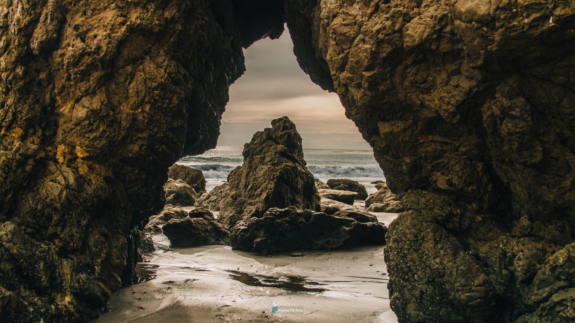 Natural rock archway on the beach with a scenic view — Samsung Frame TV art