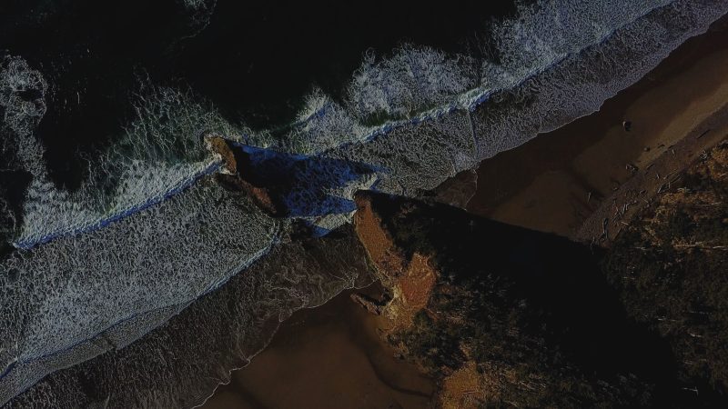 Aerial of waves crashing on a rocky beach — Samsung Frame TV art