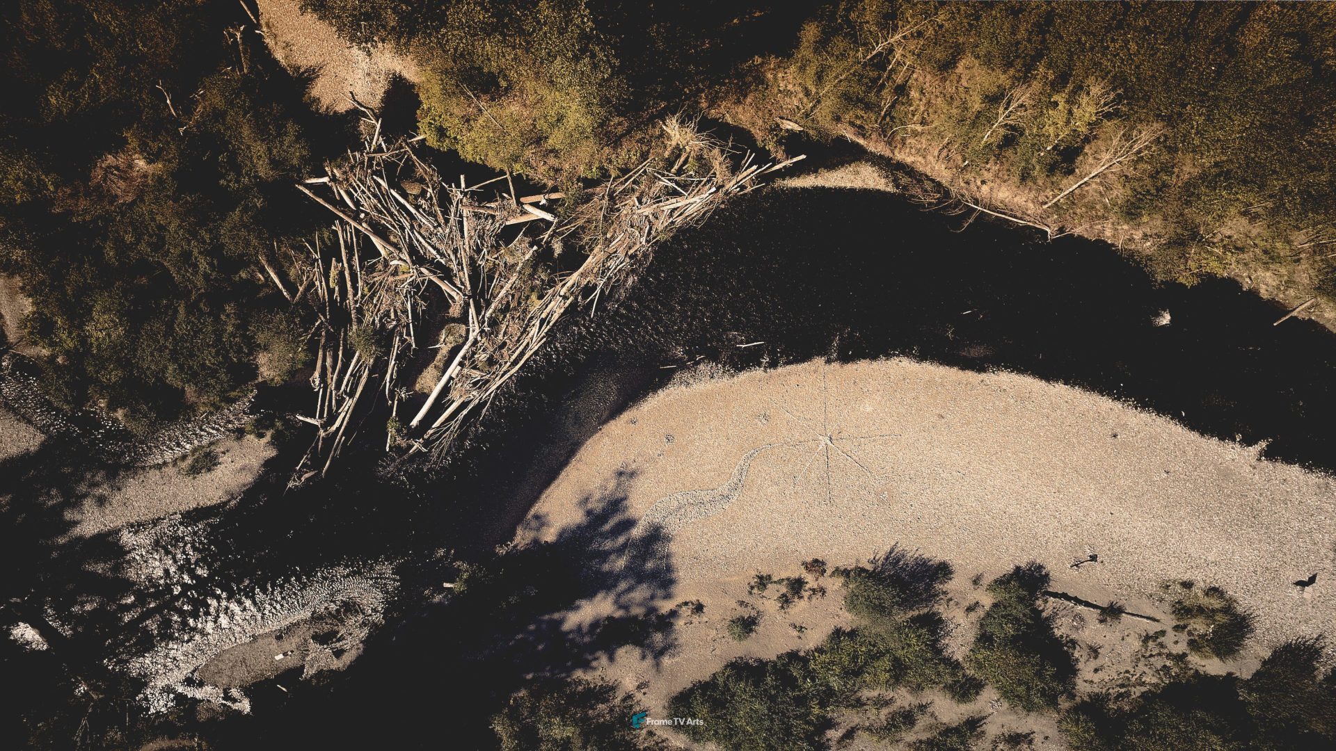 Aerial view of a riverbed with driftwood — Samsung Frame TV art