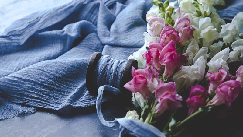 Colorful flowers and blue fabric with a wooden spool — Samsung Frame TV art