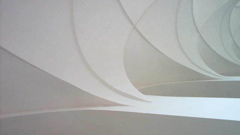 A white ceiling with curved lines — Samsung Frame TV art