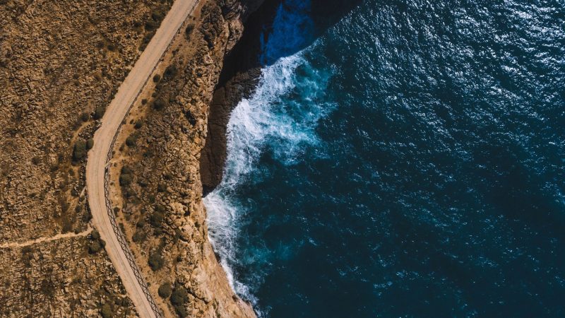 Aerial view of coastline with winding road — Samsung Frame TV art