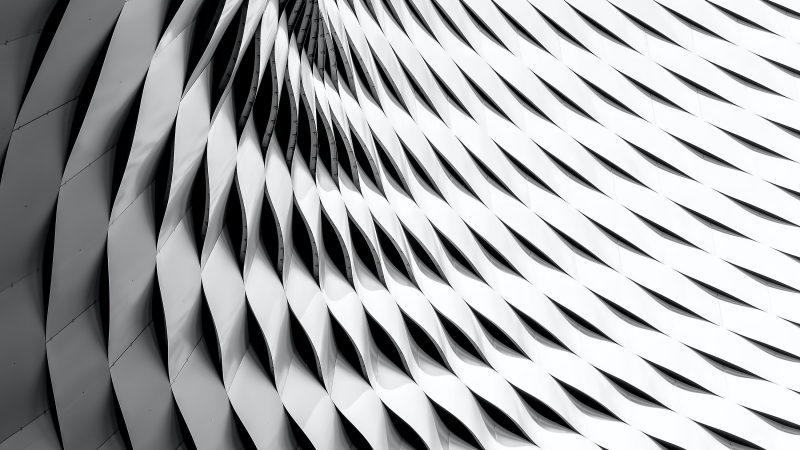 A curved facade covered in white latticework — Samsung Frame TV art